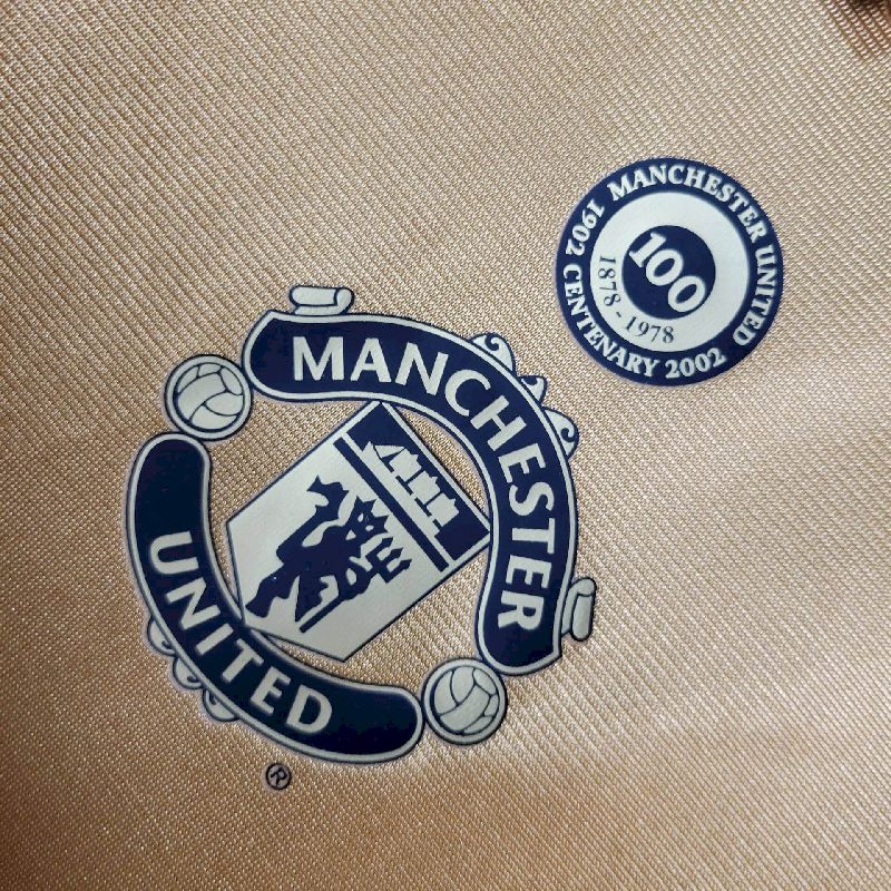 Manchester United Aniversario de 100 Anos 2002 X Camisa com 2 Lados 2° e 3° Uniforme